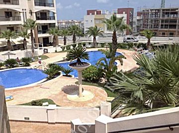 Foto Venta de piso con piscina y terraza en Guardamar del Segura, Zo3
